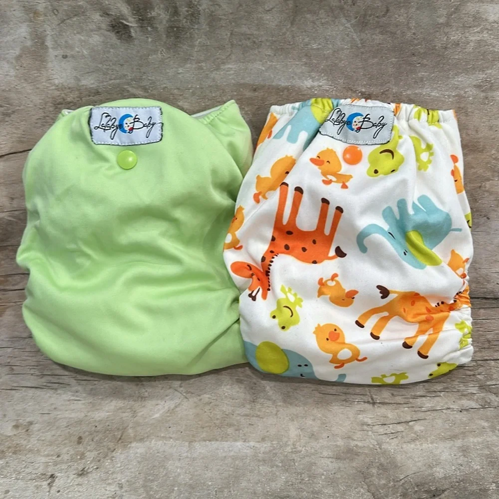 Lalabye Baby, one size cloth diapers reusable. Pair, one print one solid. *USED*
